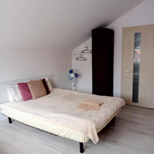 Postel nebo postele na pokoji v ubytování Apartments Villa OLGA