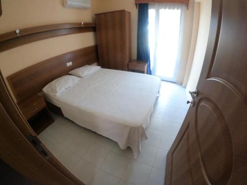 Ένα ή περισσότερα κρεβάτια σε δωμάτιο στο Dream Apart Bitez