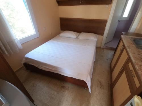 Ένα ή περισσότερα κρεβάτια σε δωμάτιο στο Dream Apart Bitez
