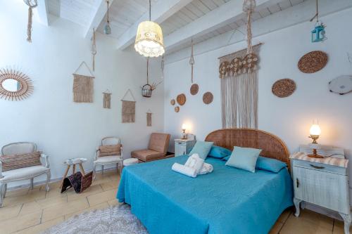 Postel nebo postele na pokoji v ubytování Masseria li Vecchi