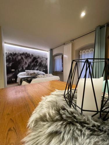 a living room with a fur rug on the floor at AEapartmentsaosta in Aosta
