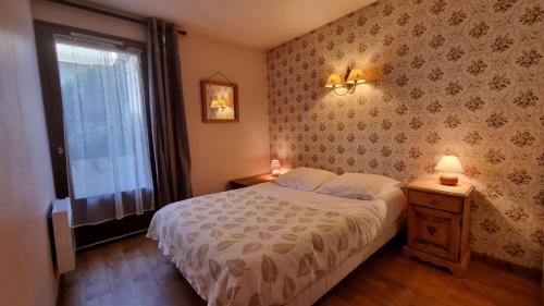 Posteľ alebo postele v izbe v ubytovaní Appartement Érable