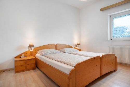Llit o llits en una habitació de Residence zum Roessl 205