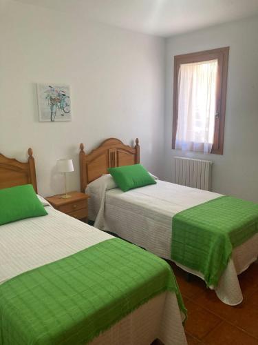 Ένα ή περισσότερα κρεβάτια σε δωμάτιο στο El Estudio de Buenavista