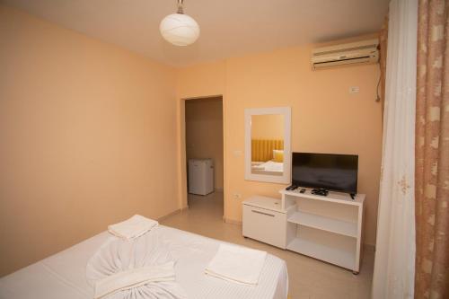 Postel nebo postele na pokoji v ubytování Hotel Sunrise