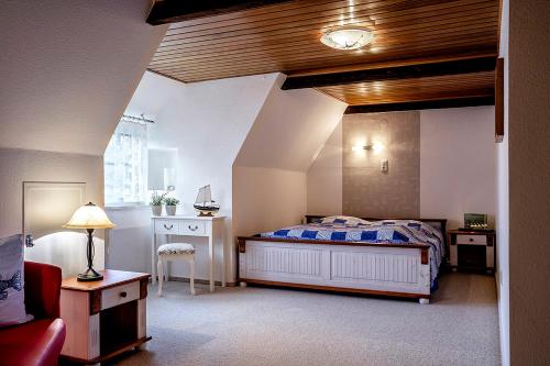 Postel nebo postele na pokoji v ubytování Ostwind