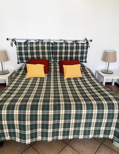 Ένα ή περισσότερα κρεβάτια σε δωμάτιο στο Agriturismo Gianferrante