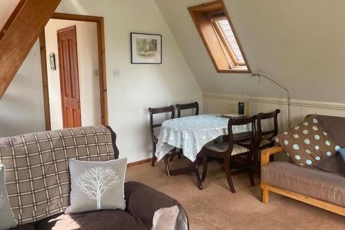 Χώρος καθιστικού στο River Lark Lodge