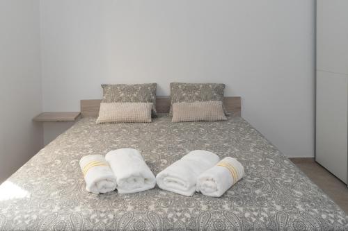Postel nebo postele na pokoji v ubytování Studio SoleMare