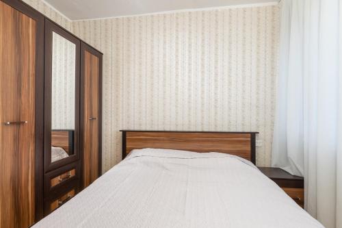 Postel nebo postele na pokoji v ubytování DniApart