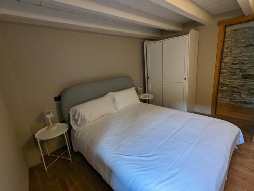 מיטה או מיטות בחדר ב-Derby Homes