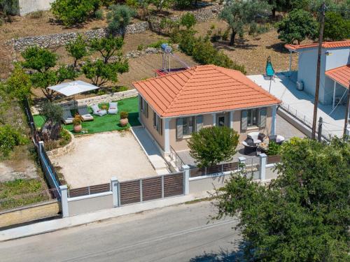 an overhead view of a house with an orange roof at Marigoulis Home in Sami