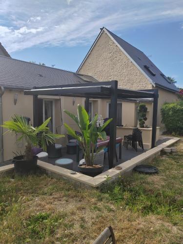 Κήπος έξω από το Chambre d'hôtes Orchidée