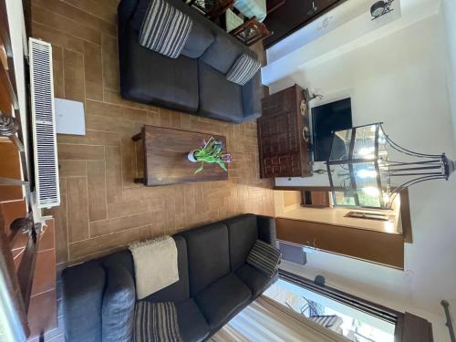 Телевизор и/или развлекательный центр в Stylish Maisonette with 3 Bedrooms in Vourvourou, Greece