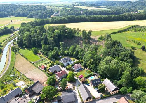 an aerial view of a village with houses and trees at Na Statku Babiččino údolí in Česká Skalice