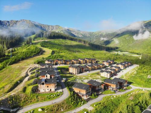 an aerial view of a resort in the mountains at Mountica Jasná in Belá