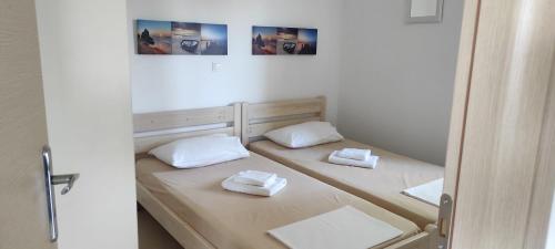 Katil atau katil-katil dalam bilik di Lakithra Apartments