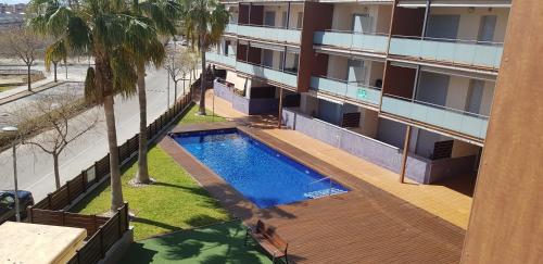 Bazén v ubytování Apartamento Residencial Deltamar nebo v jeho okolí