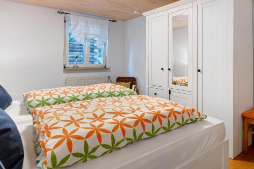 Postel nebo postele na pokoji v ubytování Zum Haselbach
