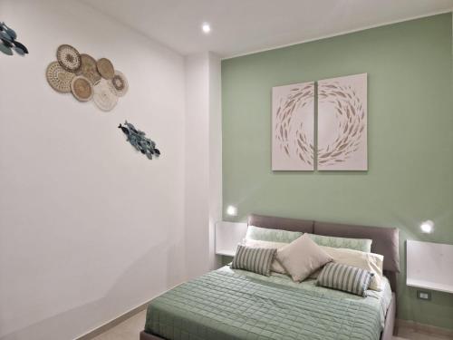 Ένα ή περισσότερα κρεβάτια σε δωμάτιο στο ondina house