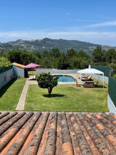 a view from the roof of a house with a pool at Refúgio da Légua in Marco de Canavezes