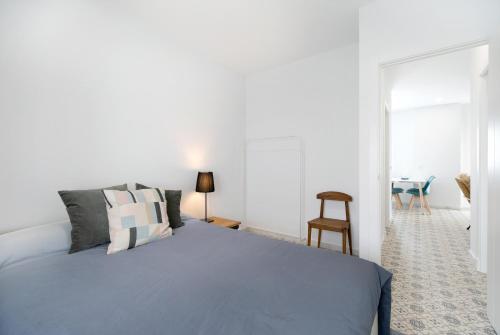 A bed or beds in a room at Marqués de Cádiz Suite Jerez Centro