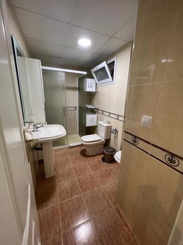 Ένα μπάνιο στο Apartamento Cozy Inns Playa