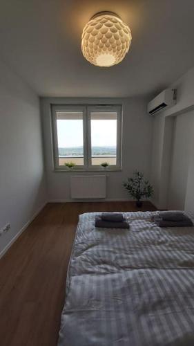 Ένα ή περισσότερα κρεβάτια σε δωμάτιο στο Apartament Self check-in