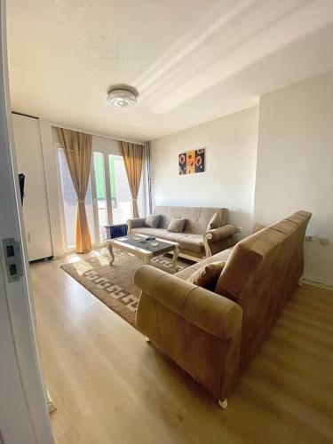 Χώρος καθιστικού στο Comfort Apartment in Prishtina