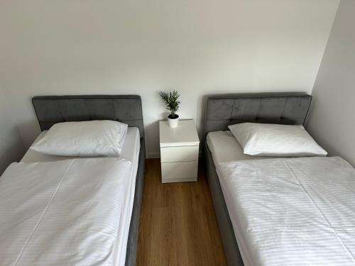 Кровать или кровати в номере Sun House