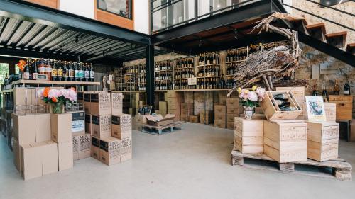 a store with boxes and flowers on display at Domaine Calmel & Joseph in Montirat