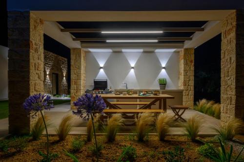 Κήπος έξω από το Nobus Villas - Luxury villa with Private pool, sea view & sunset