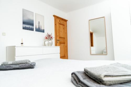 Posteľ alebo postele v izbe v ubytovaní City Center Apartment Kitzbühel