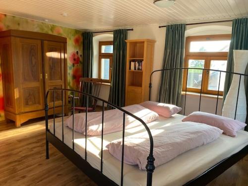 a bedroom with two bunk beds in a room at Altes Rathaus in Leibertingen