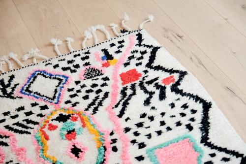 a close up of a rug on a table at Grand Pension Franziska - inkl CrossFit Gym in Saalbach Hinterglemm