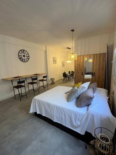 Posteľ alebo postele v izbe v ubytovaní Apartamento en Centro de Málaga