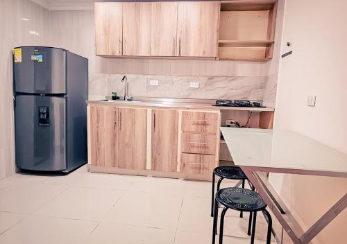 Kuchyň nebo kuchyňský kout v ubytování Casa cómoda en ubicación ideal