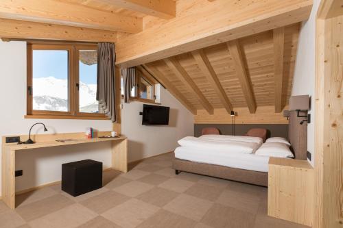 Postel nebo postele na pokoji v ubytování Hotel Li Anta Rossa