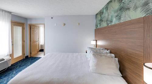 Ένα ή περισσότερα κρεβάτια σε δωμάτιο στο Park Grove Inn