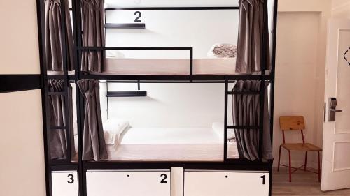 a room with two bunk beds in it at Way Hostel Madrid in Madrid