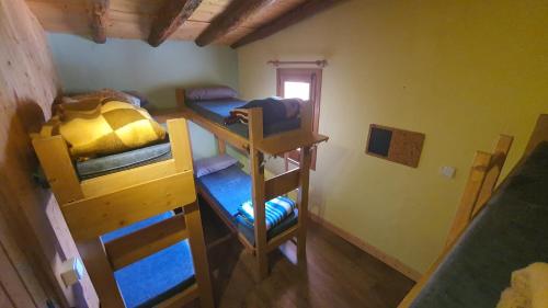 Postel nebo postele na pokoji v ubytování Refugi de Siurana