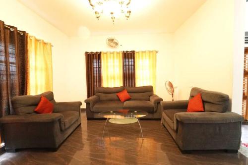 Χώρος καθιστικού στο Coorg Farm Stay