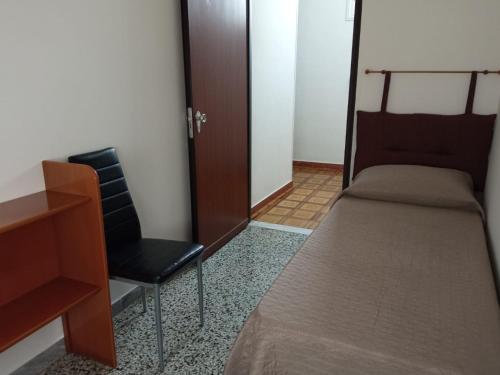 Letto o letti in una camera di CASA "JOLANDA" - SANNICOLA, A 5 KM DA GALLIPOLI