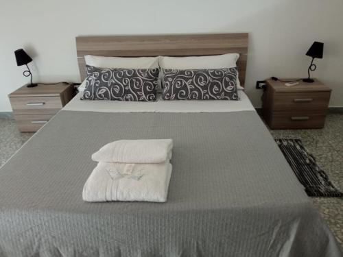 Letto o letti in una camera di CASA "JOLANDA" - SANNICOLA, A 5 KM DA GALLIPOLI