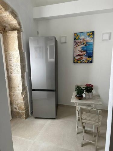 Η κουζίνα ή μικρή κουζίνα στο Kalsa’s House Noto