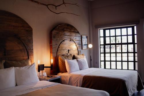 Hotel Rocaval San Cristóbal de las Casasにあるベッド