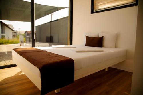 Кровать или кровати в номере MILUX