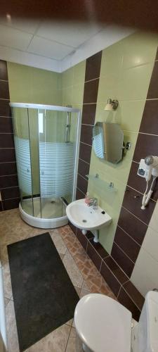 Ett badrum på Pokoje Gościnne HEVEN