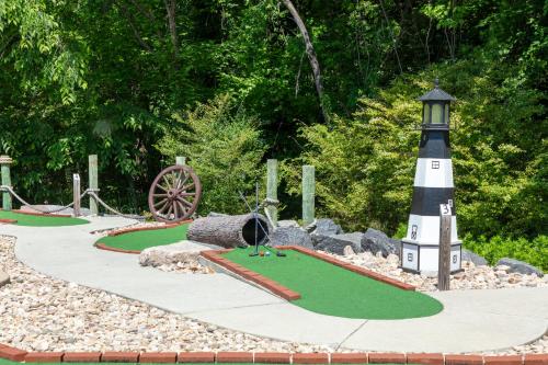 a lighthouse and golf course in a garden at Westgate Historic Williamsburg Resort in Williamsburg