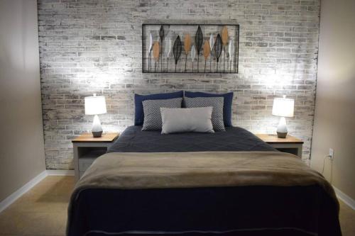 Ένα ή περισσότερα κρεβάτια σε δωμάτιο στο ZOJO_LOVELY HOUSE CLOSE TO DISNEY